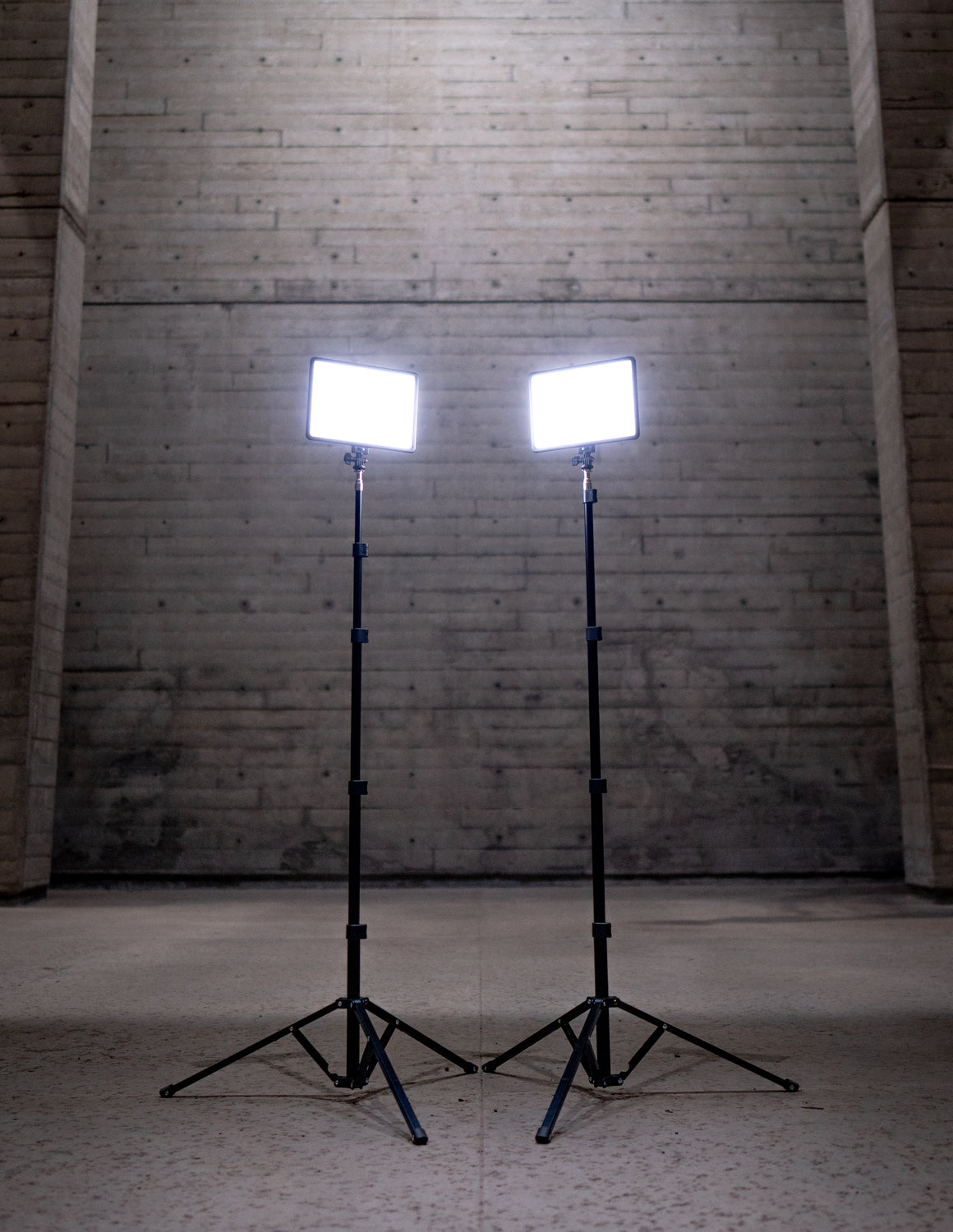 2 Studio Panels on Stands in concrete room