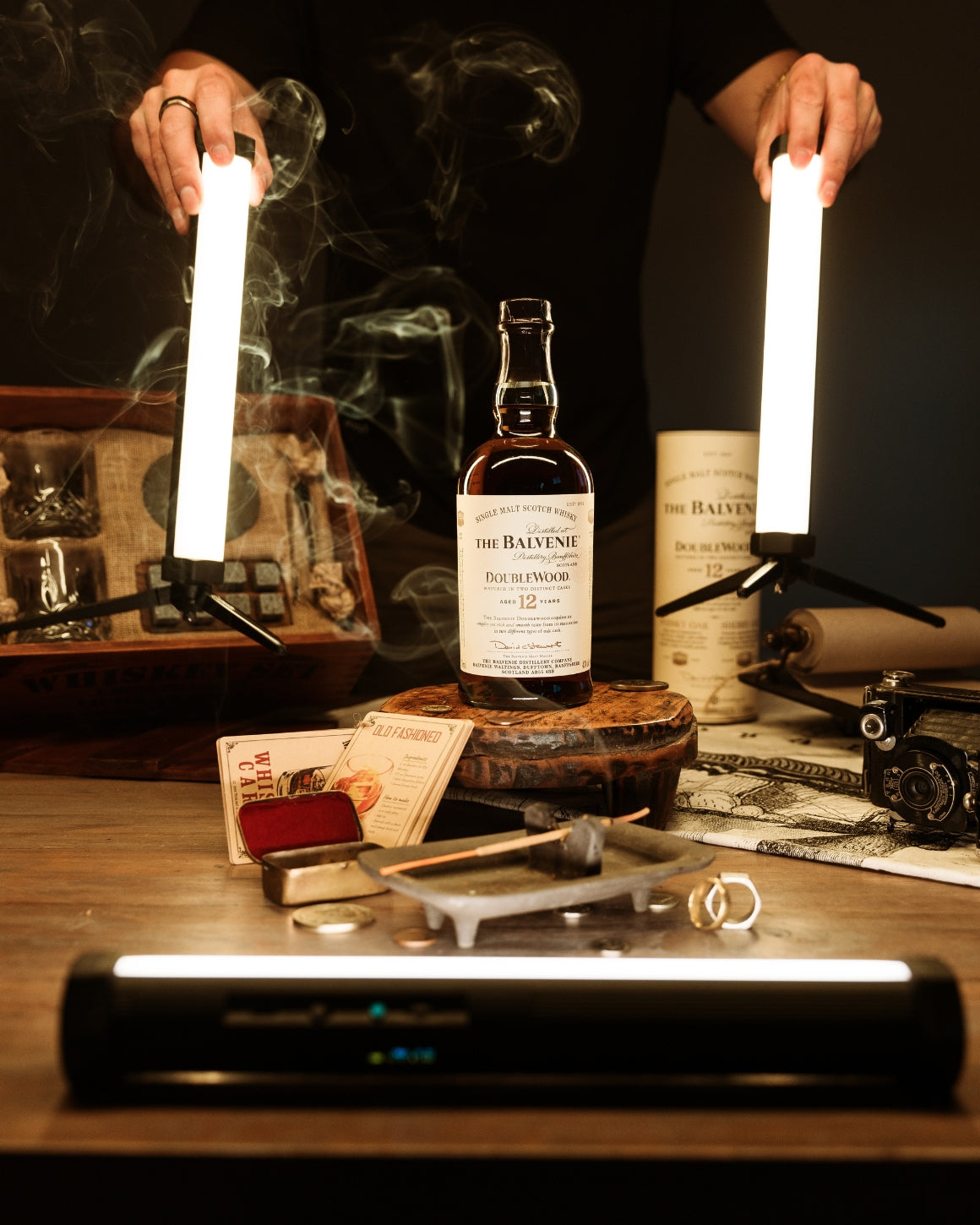 3 RGB Tube Light Mini on table with bottle and smoke LC-TLMINI