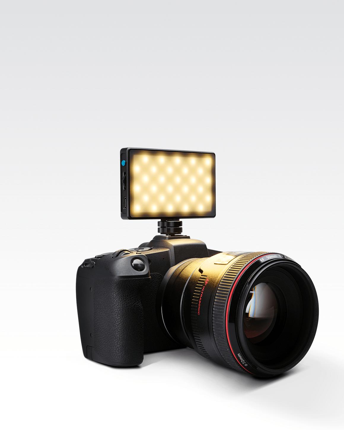 Lume Cube Panel Mini LED for lighting mounted on black Sony camera. LC-PANELMINI1