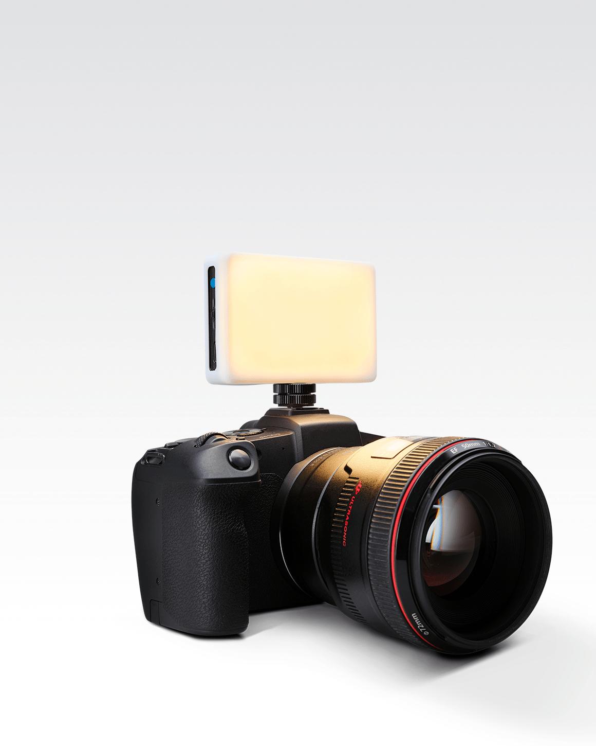 Lume Cube Panel Mini LED for lighting with white silicone diffuser attached, mounted on black Sony camera. LC-PANELMINI1