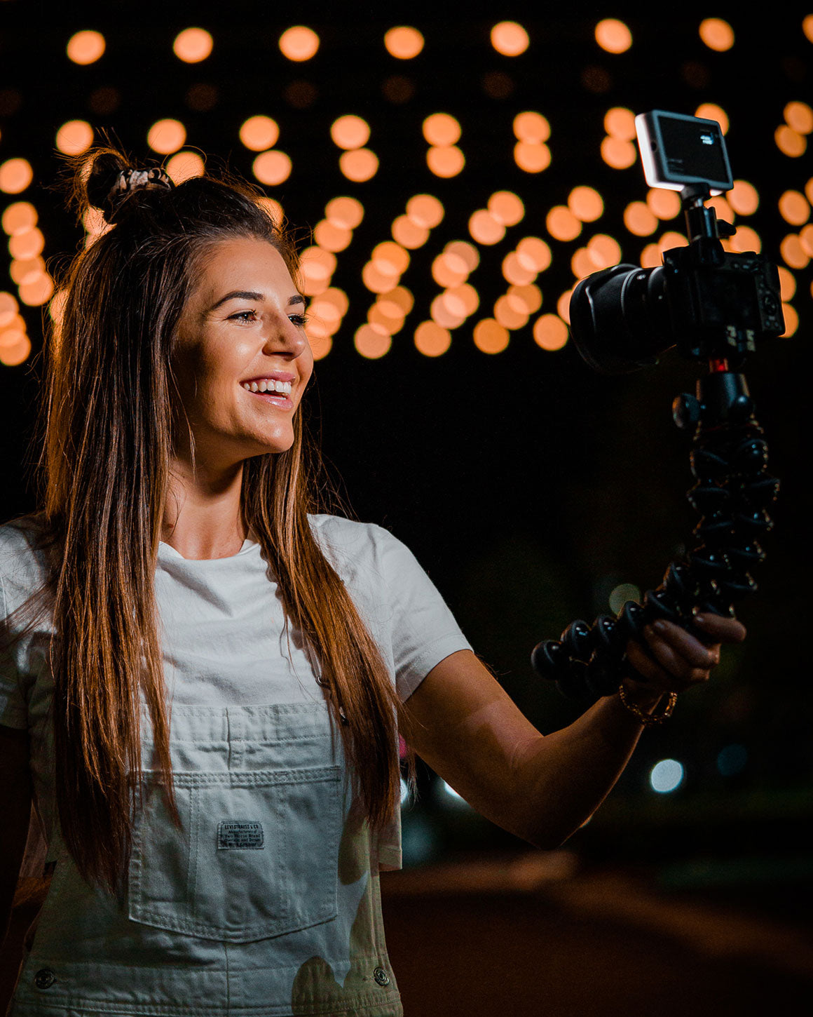 Woman using Lume Cube Panel Mini.