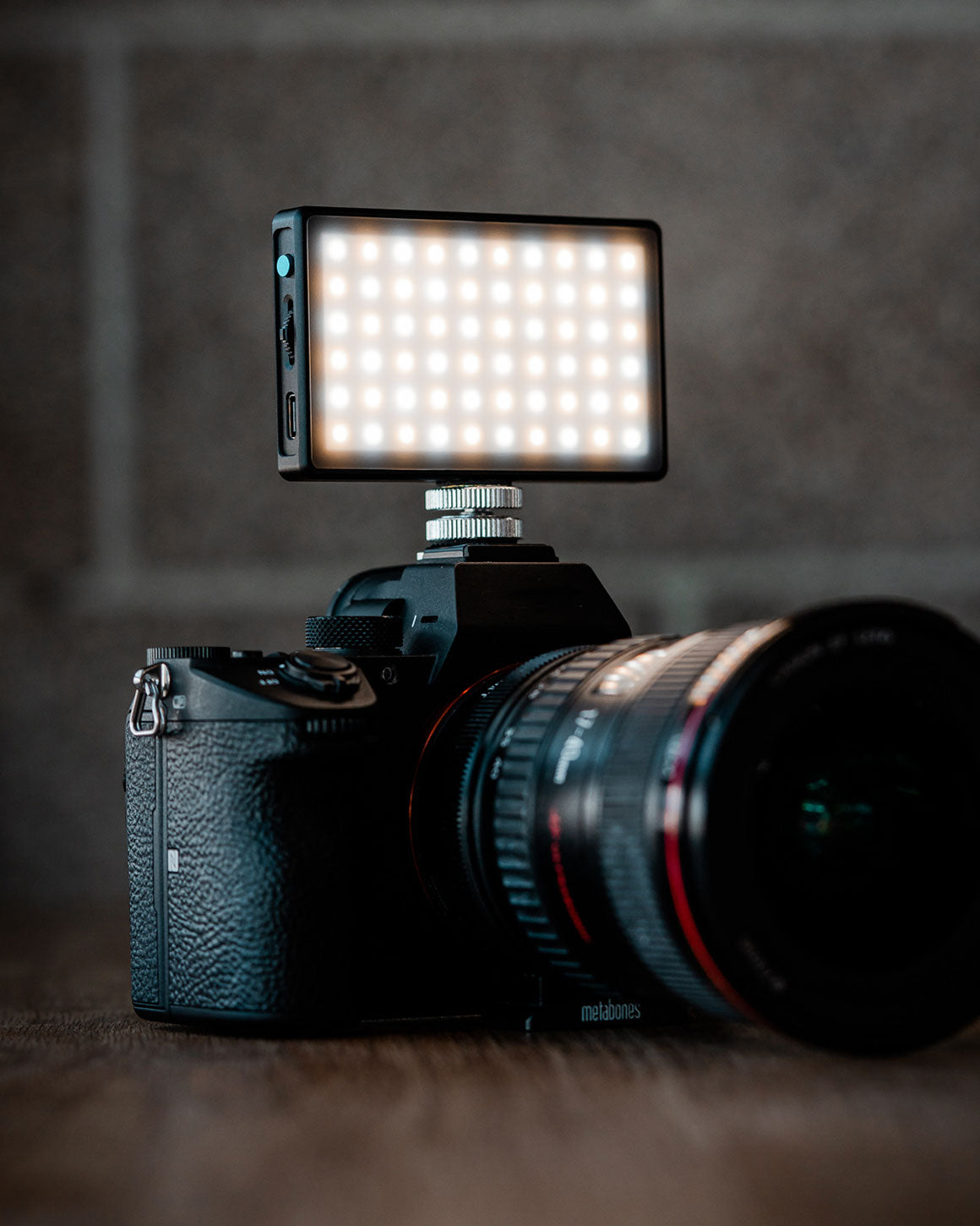 Lume Cube black metal Panel Mini LED mounted on a Sony camera.