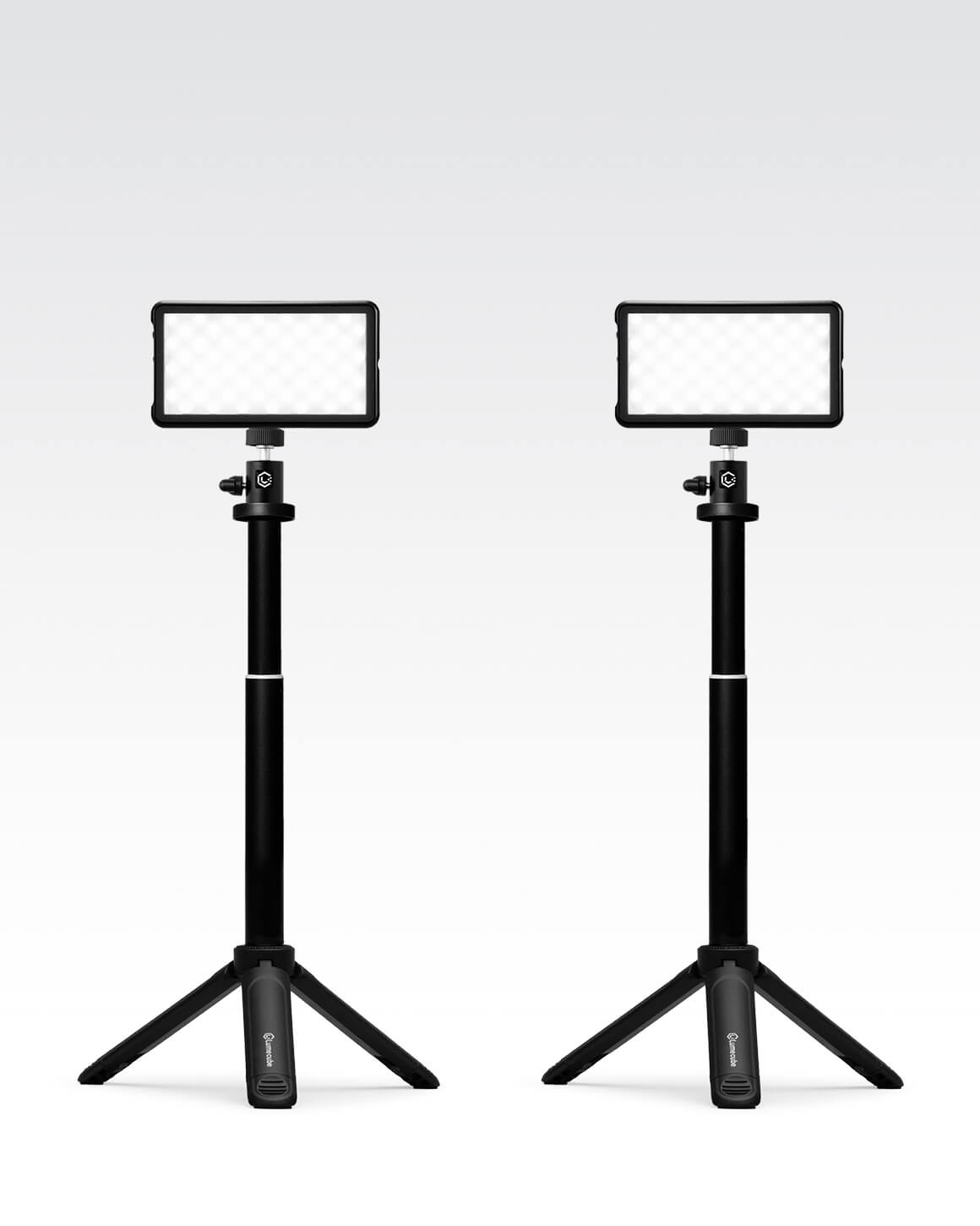Two Lume Cube Broadcast Lighting Kits with black metal adjustable stands and bicolor LED panels. LC-SB-DLX