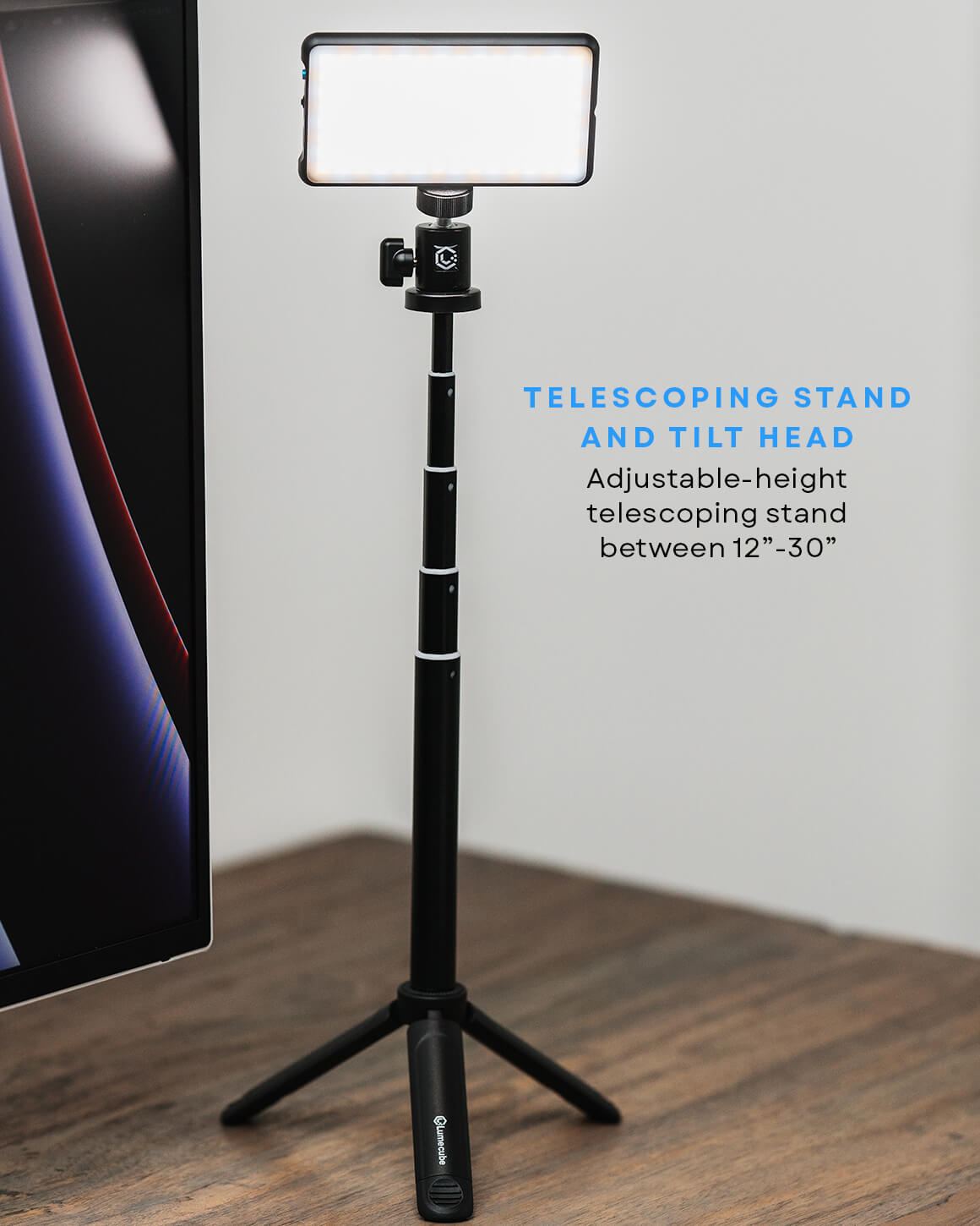 Lume Cube Broadcast Lighting Kit with RGB Panel Pro on the tilt head and telescoping height adjusted from 12" to 30". LC-BLK