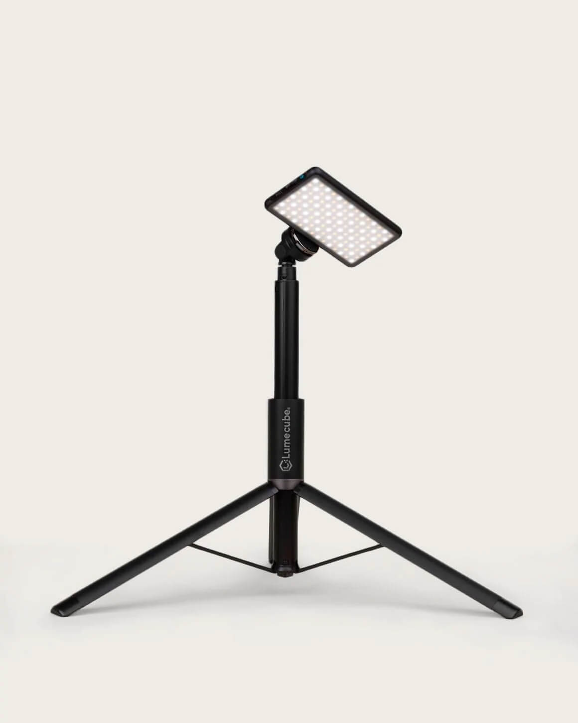 Black metal Lume Cube Adjustable Light Stand in shortest setup with a tilted LED RGB Panel Pro attached. LC-STANDT60