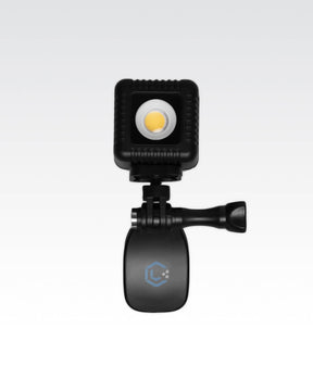 Close up of Lume Cube All-Purpose Backpack clip with Lume Cube 2.0 waterproof LED light