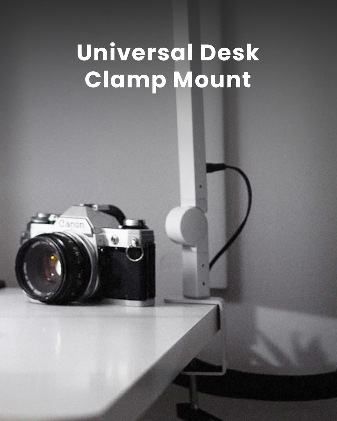 Close up of the Edge Light Desk Clamp with a camera on a desk LC-SB-EDGE2-W-2PACK