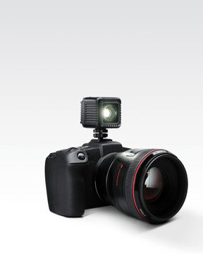 Sony camera with black 1.5" Lume Cube 2.0 Waterproof LED mounted on top. LC-SB-VC2-1-2PACK