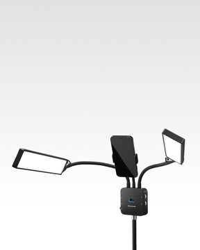 Lume Cube Flex Light Pro with LED arms facing down and smartphone in filming gooseneck.