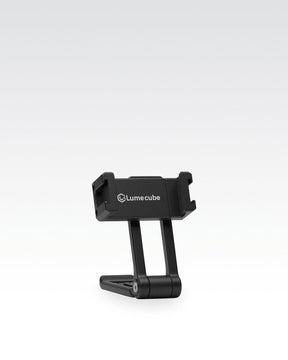 Black aluminum adjustable tilting and twisting Lume Cube Mobile Phone Clip prepared for smartphone in portrait mode.