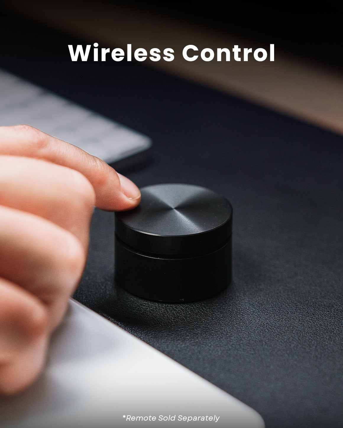 Wireless Control sold separately.  Lume Cube press-and-dial black metal wireless desktop control.