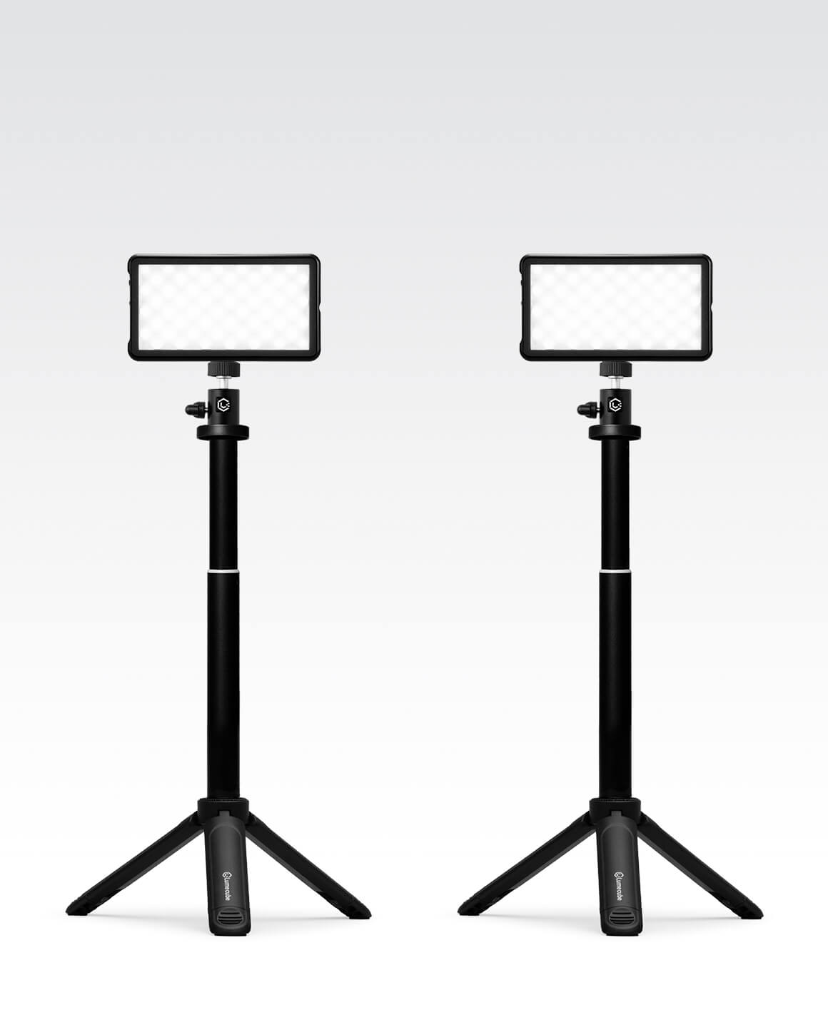 Two Lume Cube Broadcast Lighting Kits with black metal adjustable stands and bicolor LED panels.