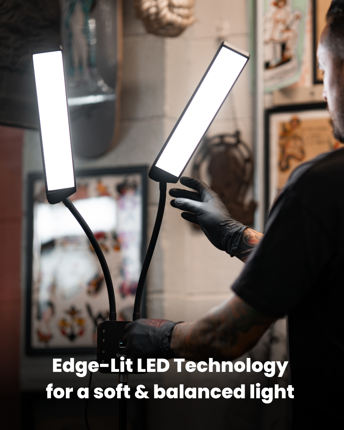 Tattoo artist adjusting Flex Light Pro